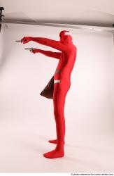 JOEL_ADAMSON CHRISTMAS VILLAIN WITH TWO GUNS